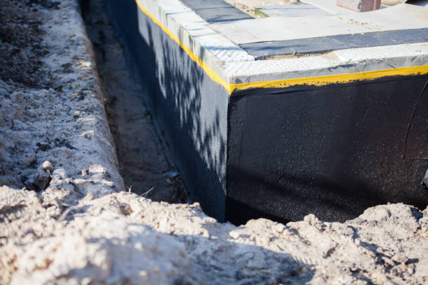 Professional Waterproofing technician working in Arcola, IL